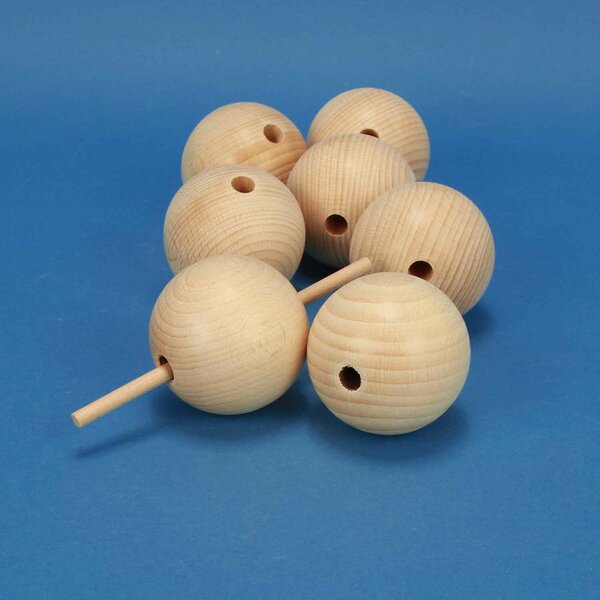 Sphères en bois Ø 60mm percés 10mm